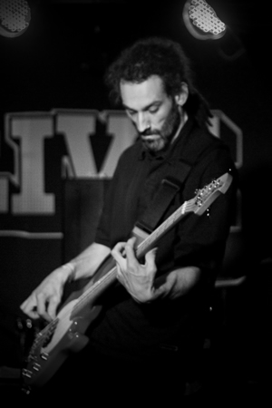 Joel - The Bass. He smiles sometimes